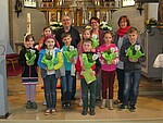 Logo Buchsübergabe an Kommunionkinder