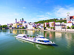 Logo Wassermusik mit dem Cabrioschiff auf der Donau
