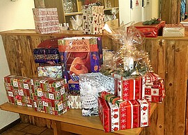 Banner Jahresschlußfeier mit Packerlversteigerung